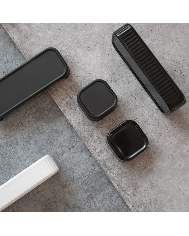 Maniglia per mobile WEGA maniglia design posata su una superficie grigia
