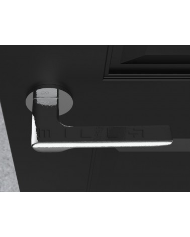 Maniglia per porta in zamak LIGNE ferramenta design vista dall'alto montata su una porta