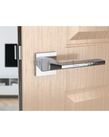 Maniglia per porta in zamak ETNA ferramenta design colore 2 vista frontale montata su una porta