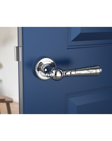 Maniglia per porta in zama MILLENAIRE design colore 1 vista frontale montata su una porta
