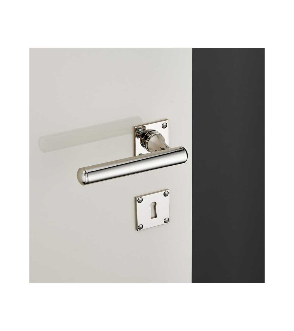 Set maniglia per porta arrotondata in ottone su rosetta quadrata