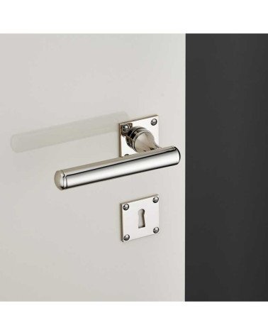 Set maniglia per porta arrotondata in ottone su rosetta quadrata