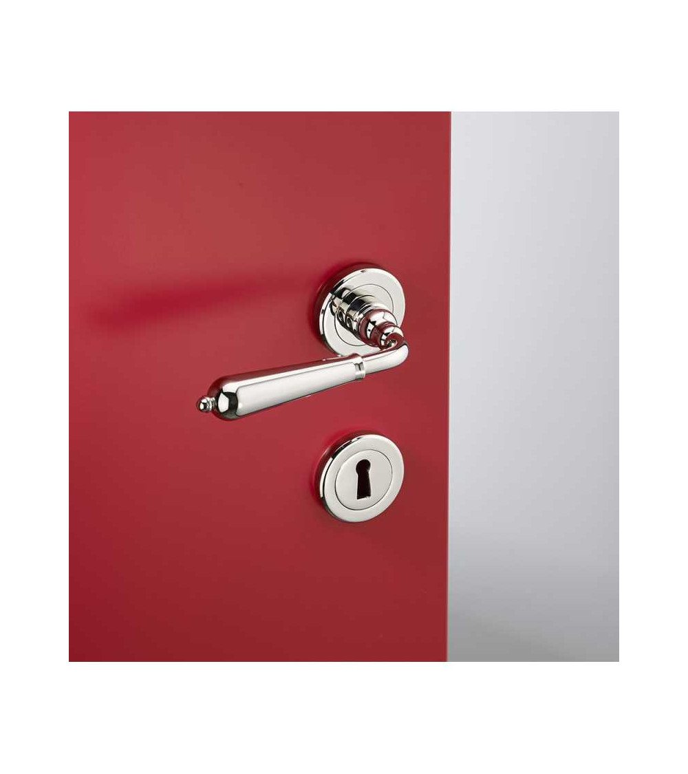 Set maniglia a leva per porta moderna in ottone su rosetta rotonda