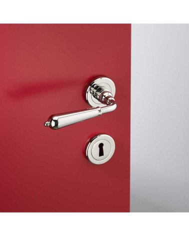 Set maniglia a leva per porta moderna in ottone su rosetta rotonda