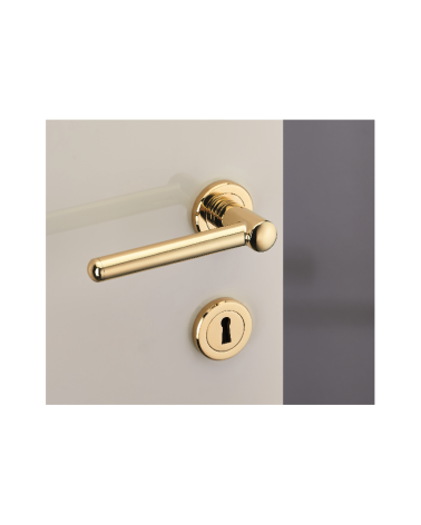 Set maniglia per porta moderna in ottone su rosetta rotonda