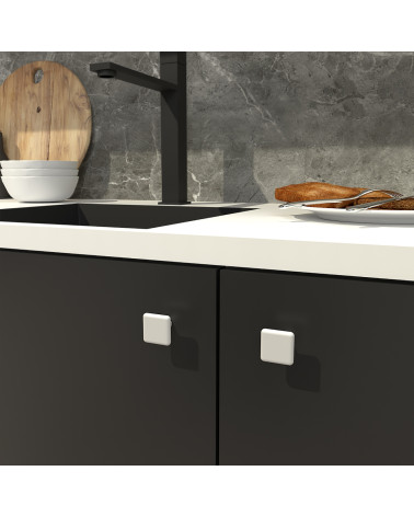 Pomello per mobile bianco NOX maniglia design fissata su un mobile