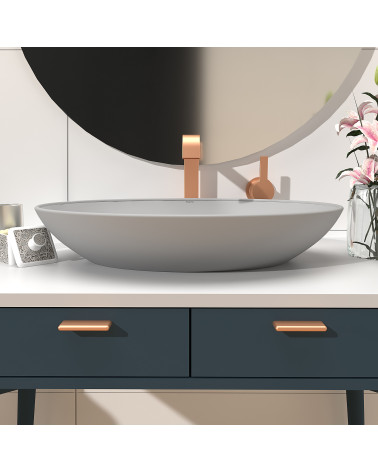 Maniglia per mobile color rame NOX-1 maniglia design montata su un mobile bagno