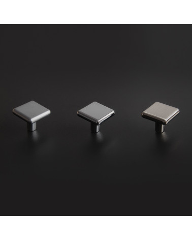 Pomolo per mobile titanio NOX maniglia design disposto su uno sfondo scuro