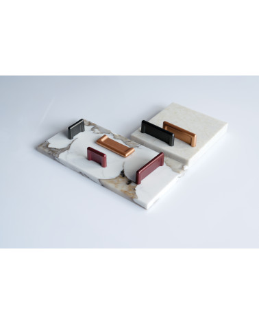 Maniglia per mobile NOX-1 maniglia design presentata su delle placche