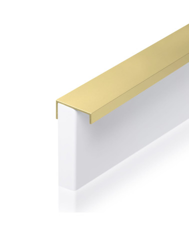 Maniglia per mobile anodizzata oro VERA design fissata al bordo di un pannello bianco