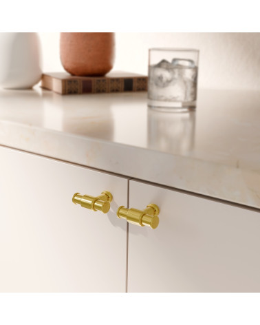 Pomello per mobile GALIUM oro lucido maniglia design montato su un mobile